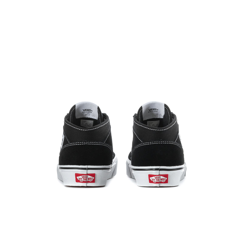 Youth black high-top sneakers, back view with white soles and heel branding