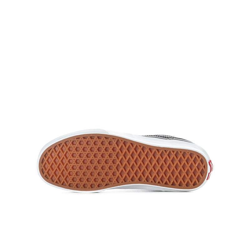 Youth high-top sneaker outsole with textured rubber tread and gum-style color