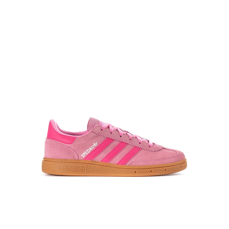 Kids pink suede sneaker with three adidas-style stripes and gum rubber sole