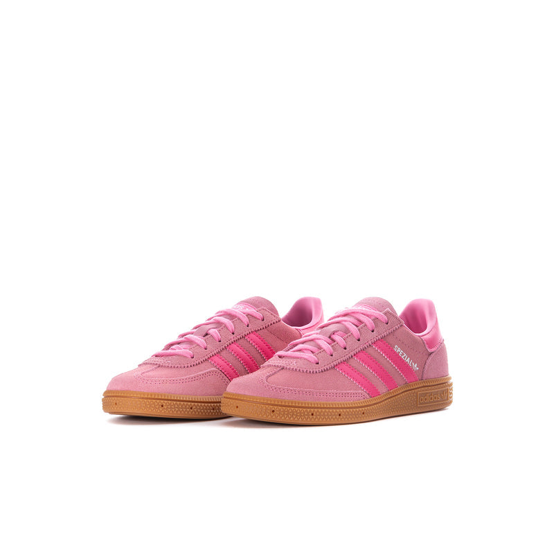 Kids pink sneakers with lace-up front, three stripe detailing, and gum outsole