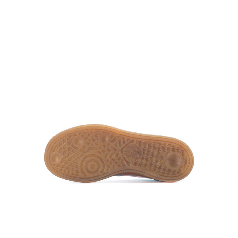 Kids adidas sneakers outsole, textured gum rubber with tread pattern
