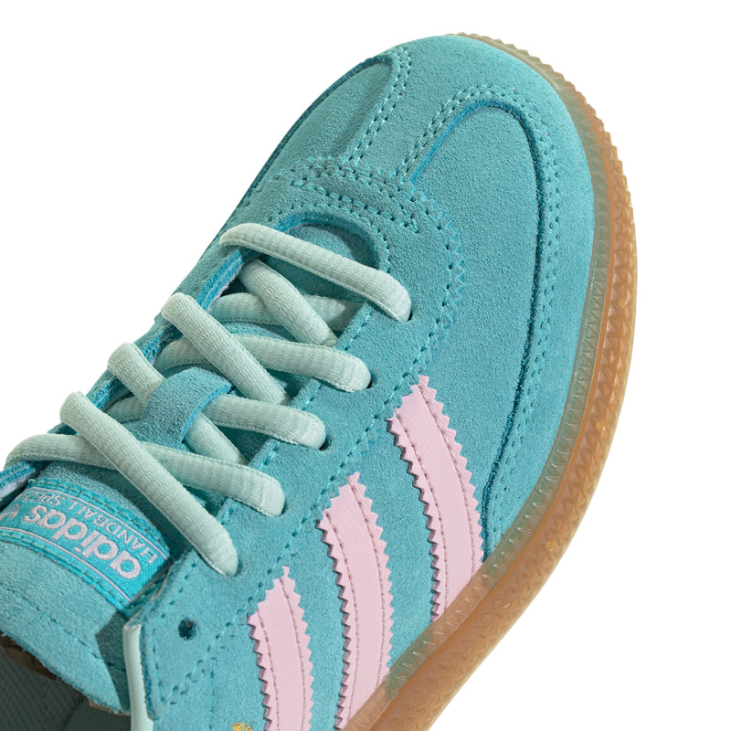 Close-up of kids adidas sneaker toe and laces, aqua suede and pink stripes