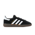 Black suede men's sneaker with white stripes and gum-brown rubber sole