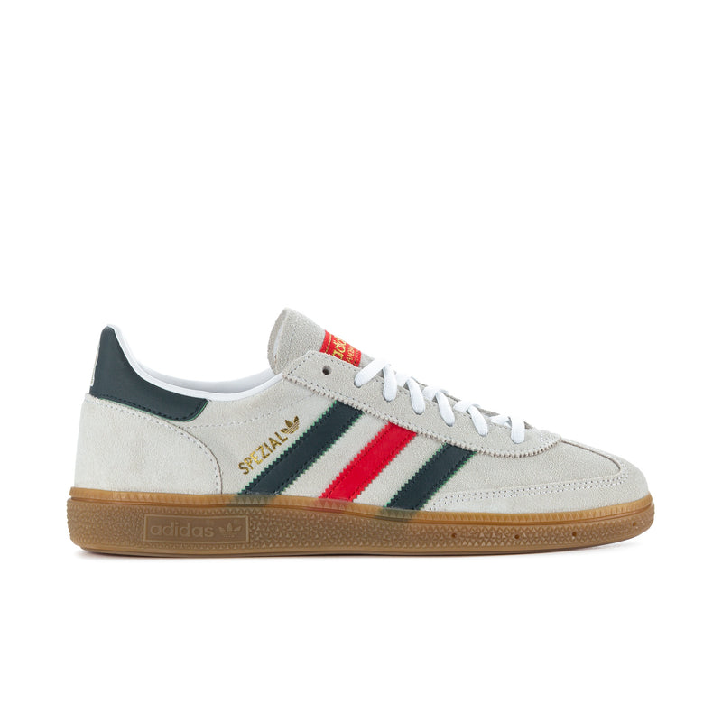 Men's low-top suede sneaker in white with red and green stripes, gum sole