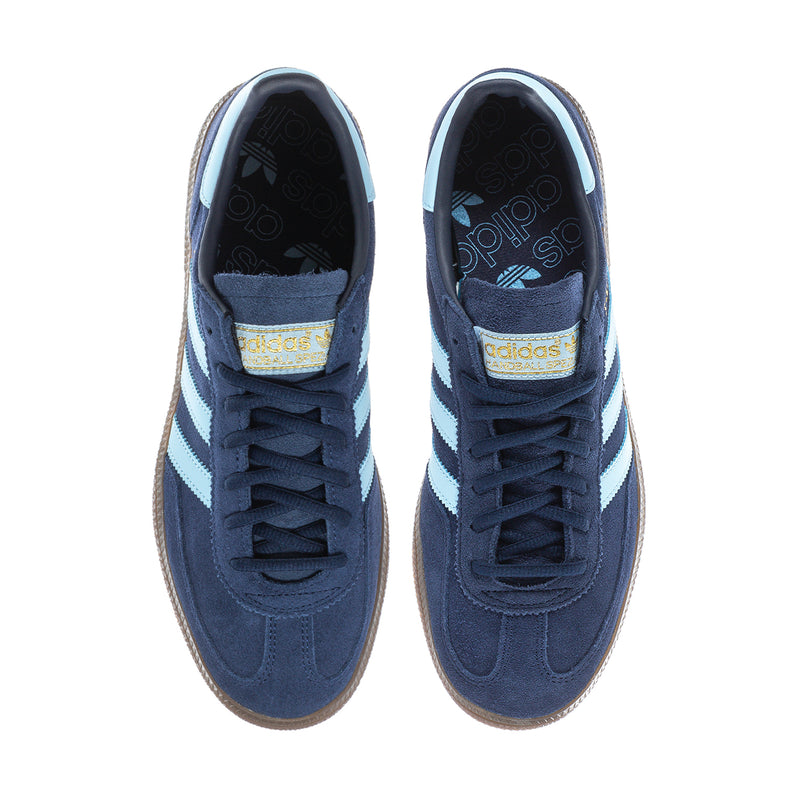 Navy lace-up sneakers with light blue stripes and blue heel lining, front view.