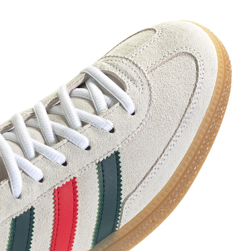 Men's sneaker upper in white suede with lace eyelets and side stripe panels