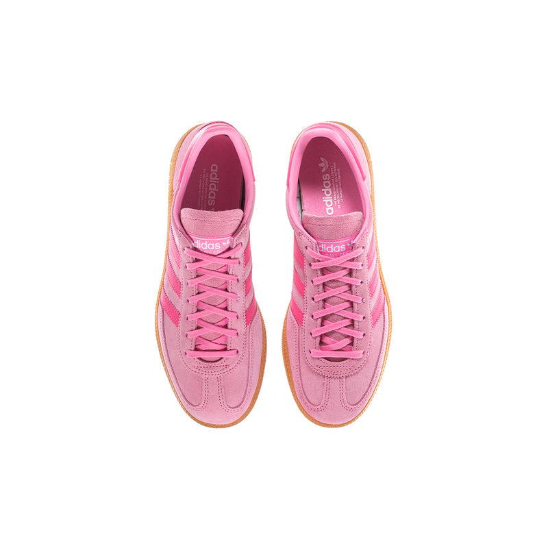 Youth pink adidas sneakers shown from inside with laces and cushioned lining