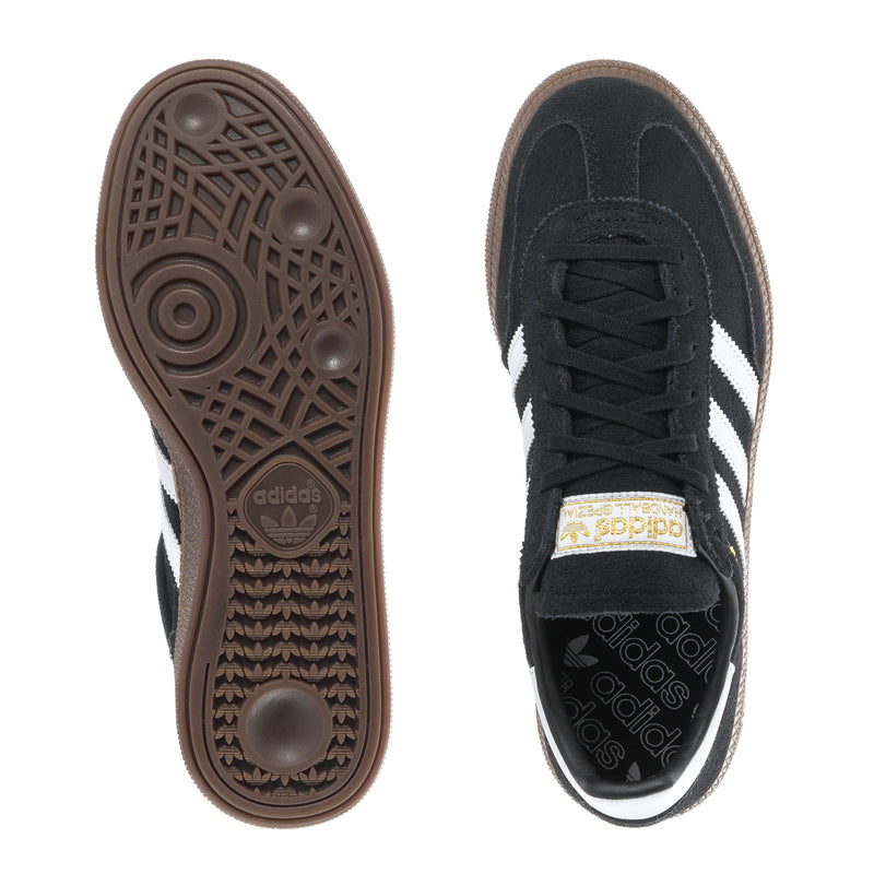 Youth black adidas sneakers: treaded outsole and lace-up top view