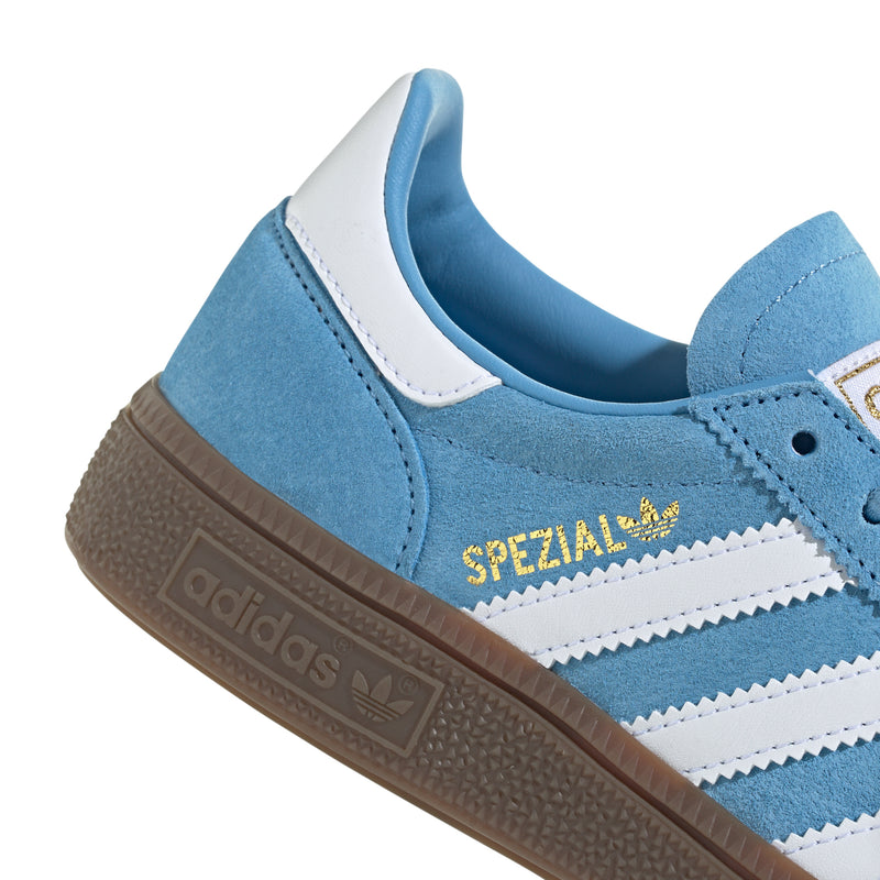 Youth light blue sneaker with white stripes and gold "Spezial" logo on the side