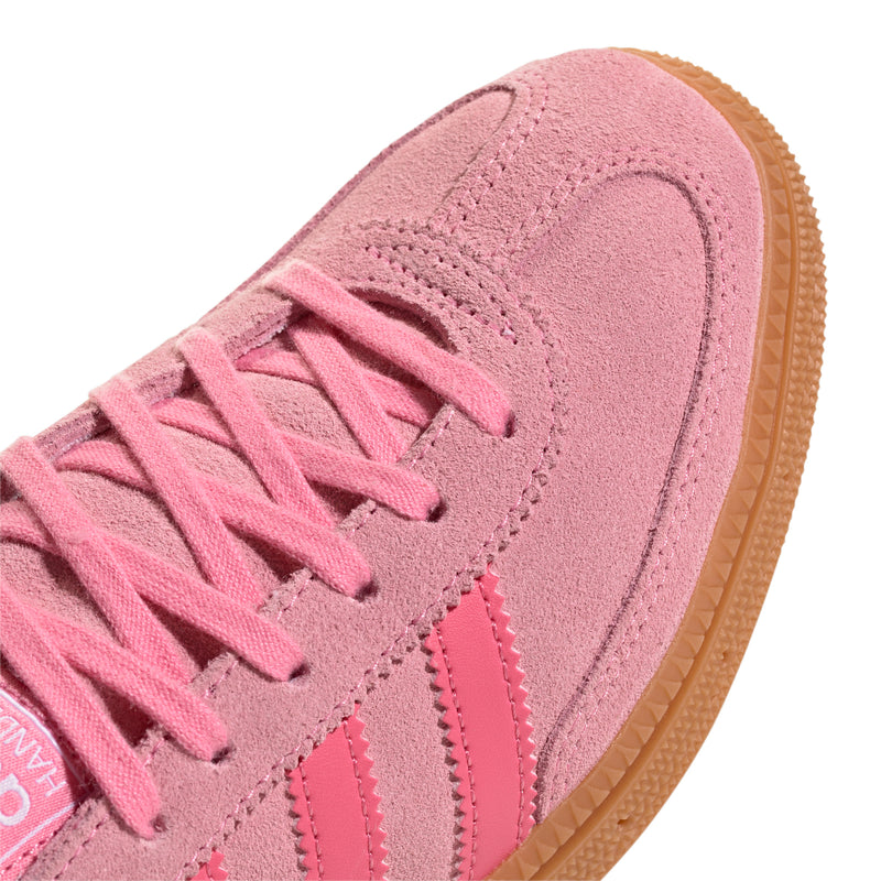 Youth pink suede adidas sneaker upper with lace-up detail and stitched seams