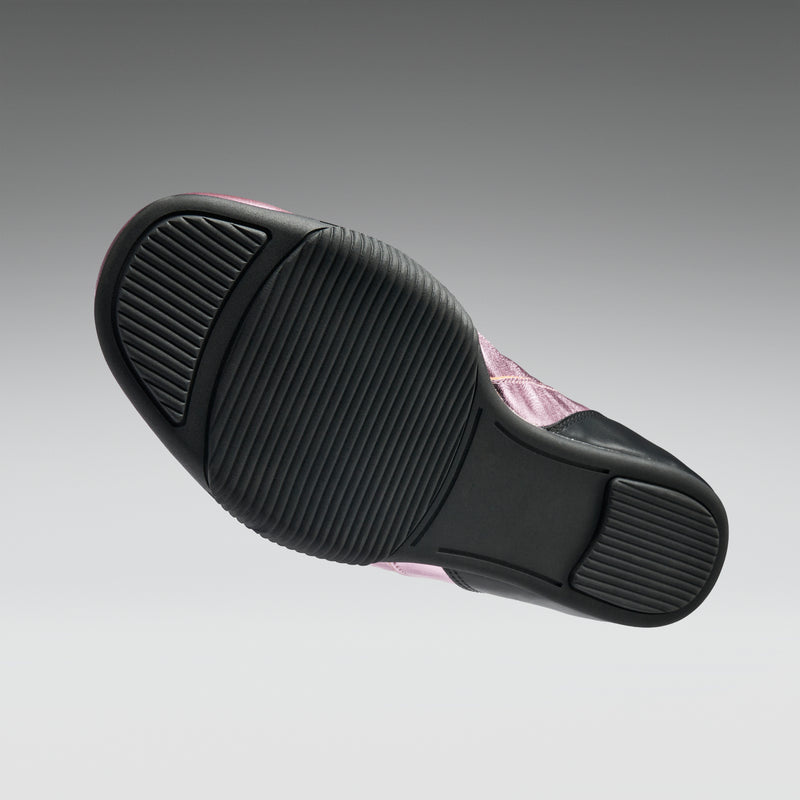 Black sole of a shoe on a gray background