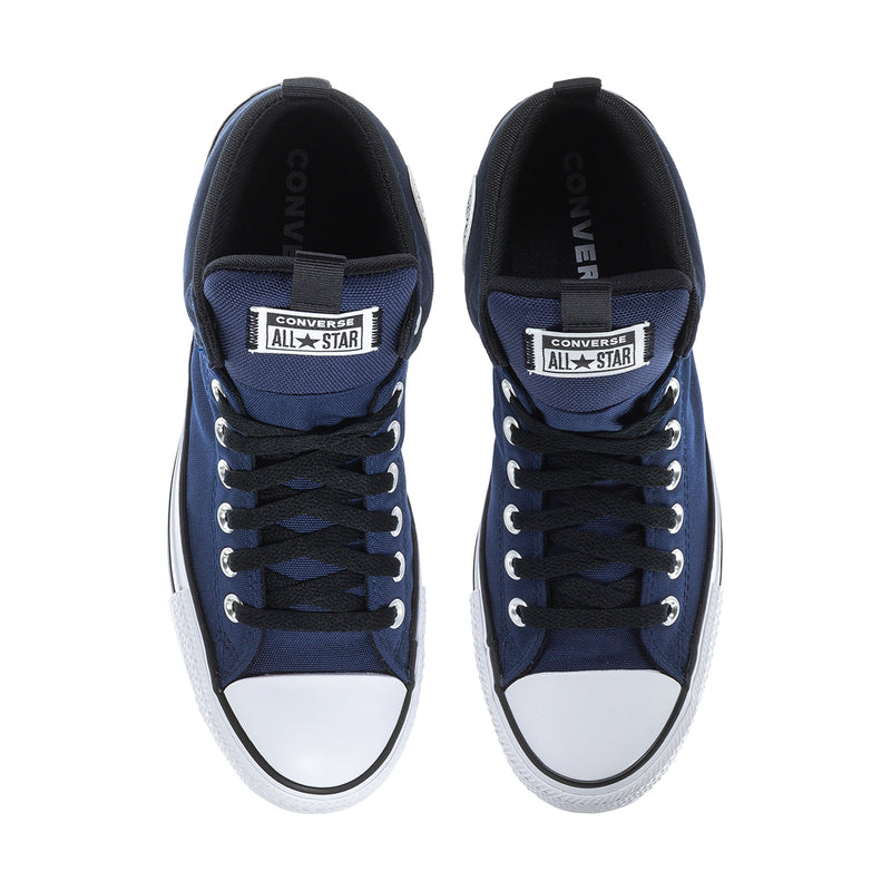 Navy high-top sneakers front view with Converse All Star heel tongue labels and black laces