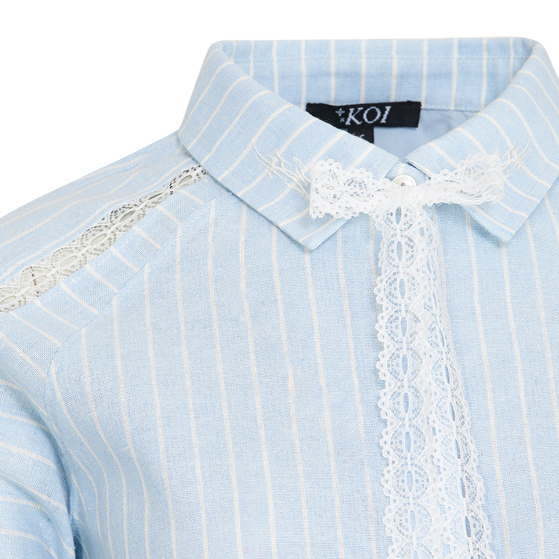Light blue striped shirt with lace details and Koi brand label.
