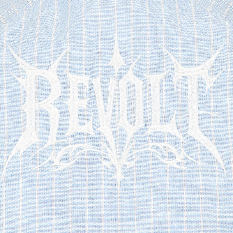Text 'Revolt' in a stylized font on a light blue textured background
