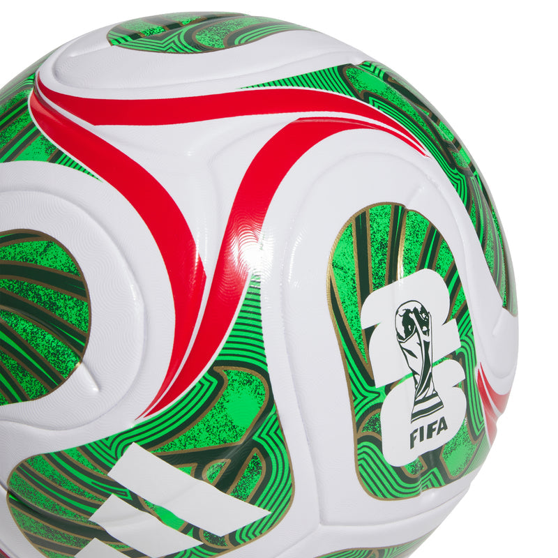 White soccer ball with green flame-like shapes, red curving stripes, and FIFA emblem.