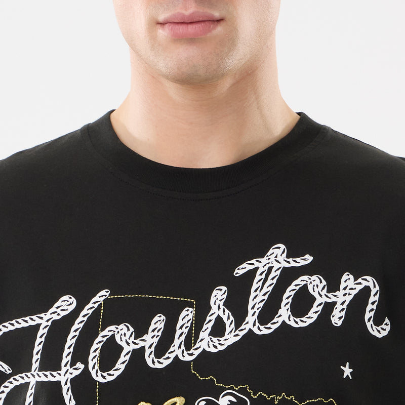 Men's black western tee close-up of Houston script and Astros logo graphic on chest