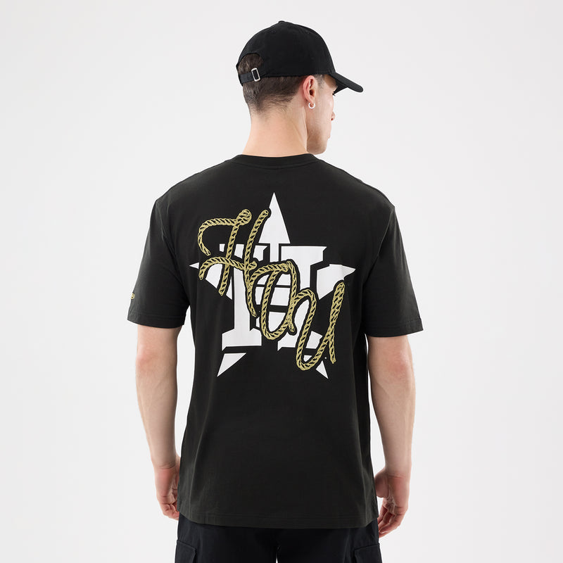 Men's black western tee back view with large Houston Astros graphic in white and gold