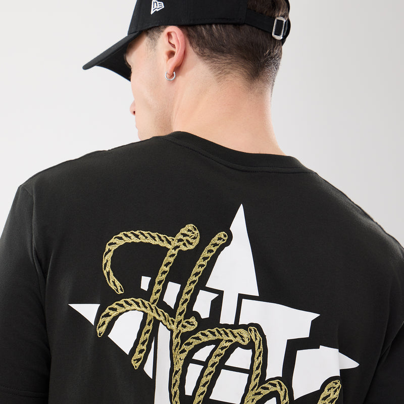 Men's black western tee back close-up with Houston Astros graphic over shoulders