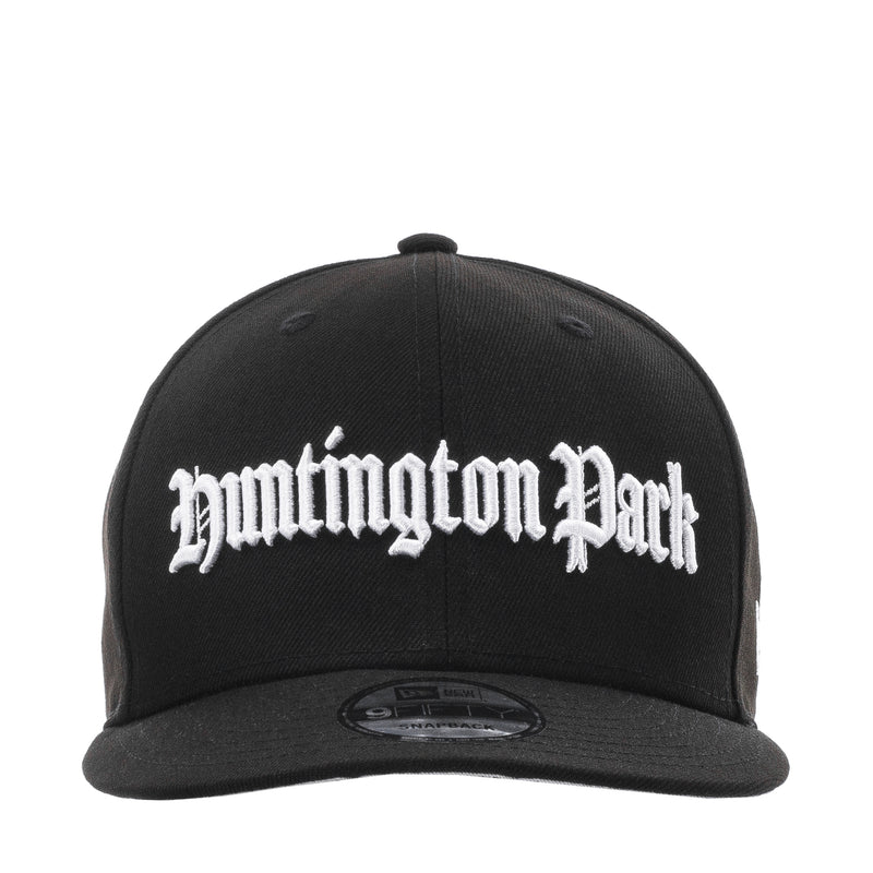 Black baseball cap with white Huntington Park script logo on the front panel