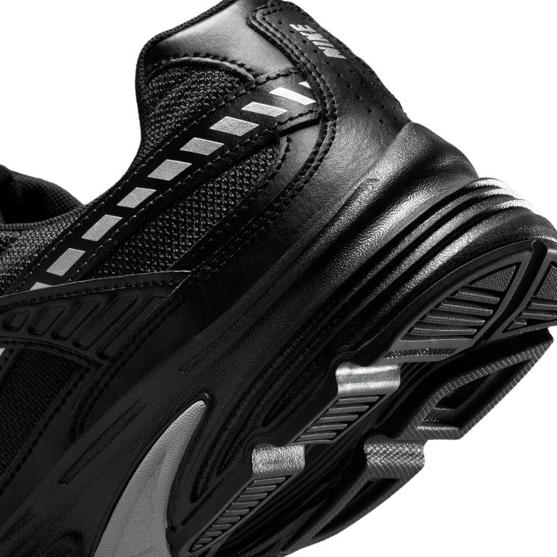 Men's Nike Initiator sneaker close-up, perforated black upper and ribbed sole
