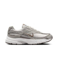 Nike women's running shoes, light bone with phantom and mink brown accents