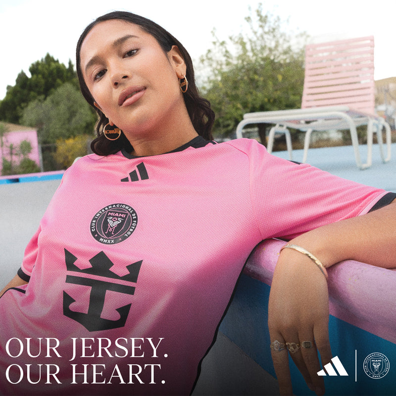 Easy pink youth Inter Miami soccer jersey with large crest and black emblem