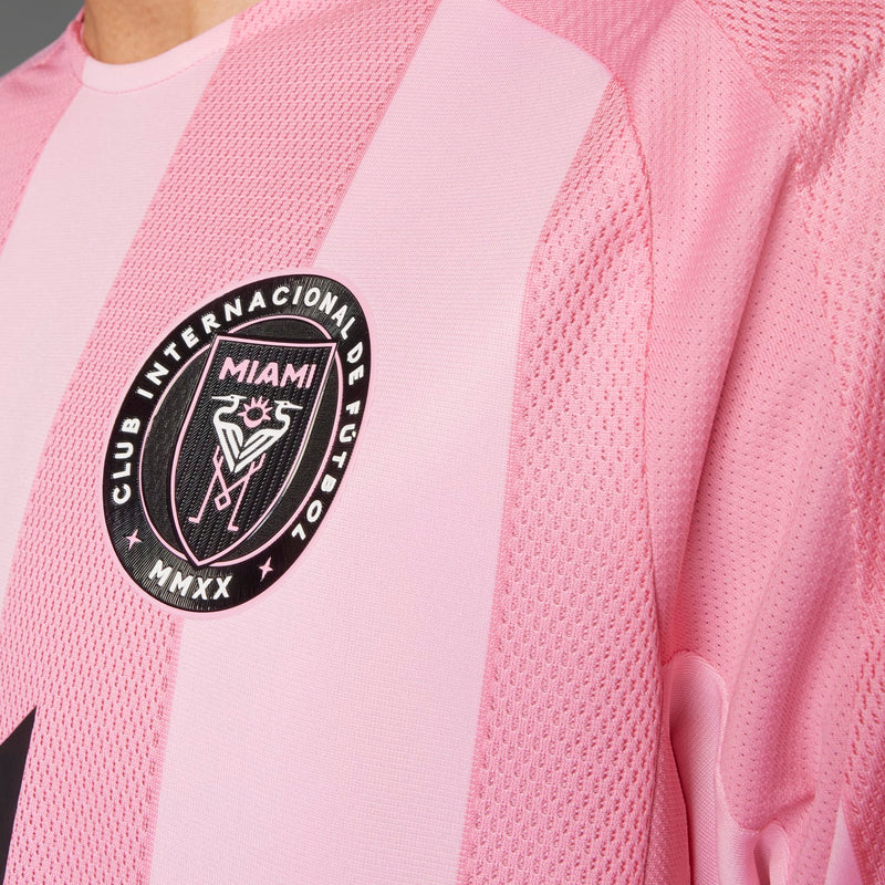 Inter Miami pink jersey fabric detail with round team crest patch