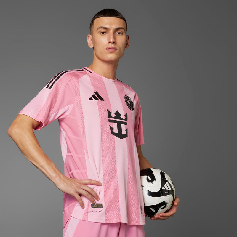 Men's light pink home soccer jersey, front side view with black Adidas logo