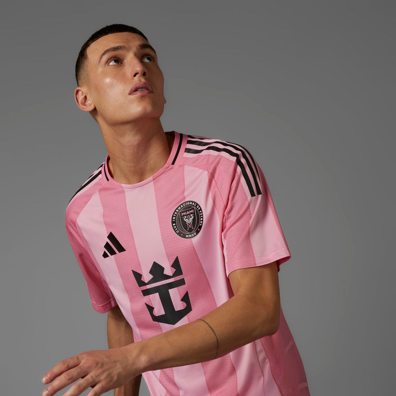 Men's light pink home soccer jersey, close-up chest with crest and Adidas logos