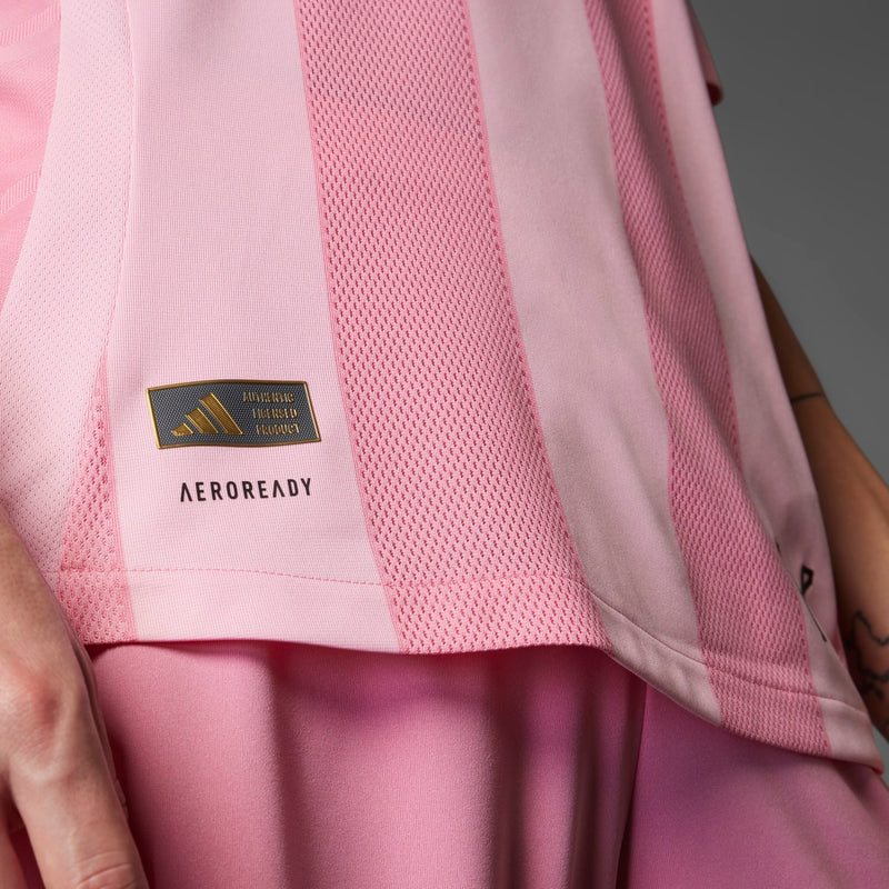 Light pink jersey with AEROREADY label and mesh-textured side panel detail