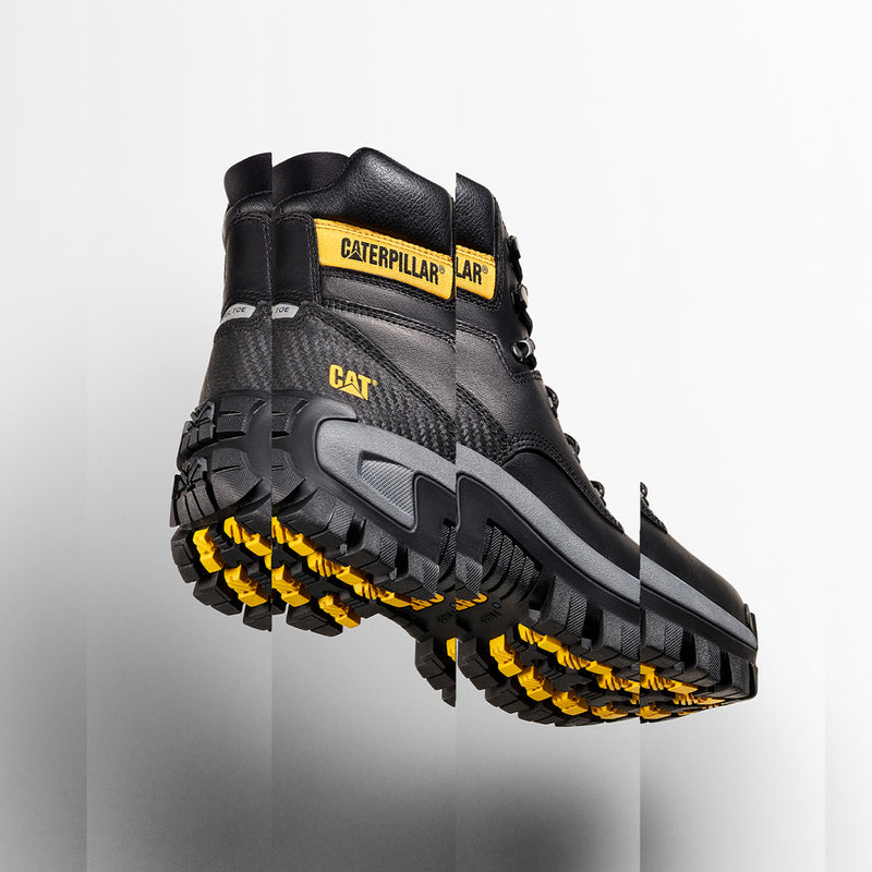 Men's black steel-toe boot with thick tread outsole and yellow grip lugs