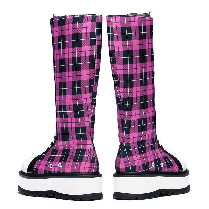 A pair of long platform boots with a pink checkered pattern, featuring a chunky sole and lace-up closure - back view