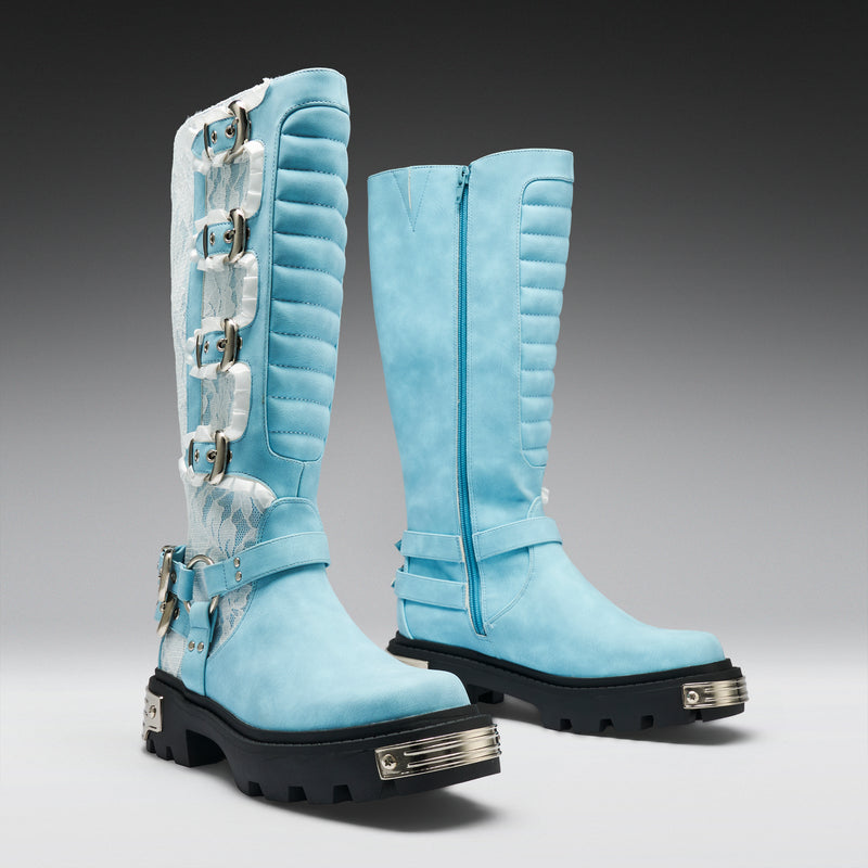 Light blue knee-high boots with silver buckles on a gray background