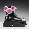 Black boot with pink fuzzy mouse head design on a gray background