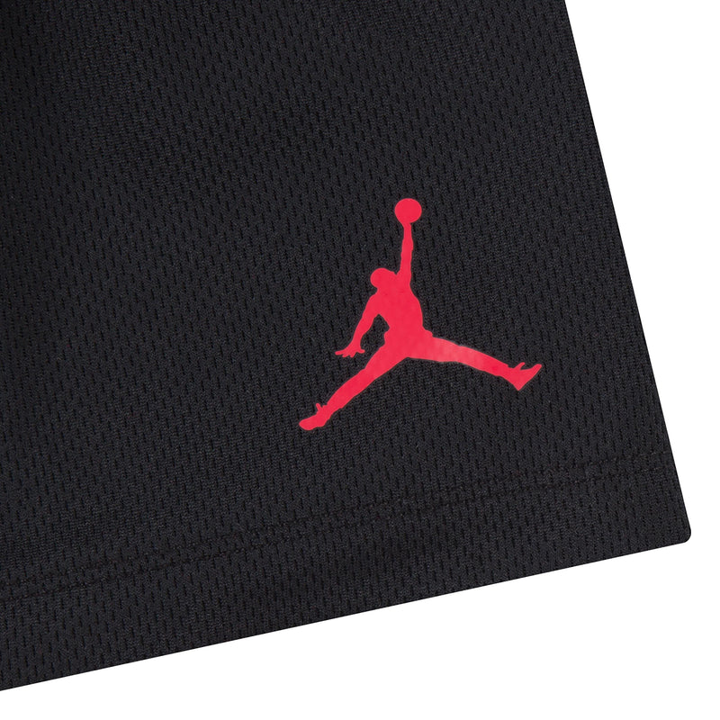 Black shorts close-up with red Jordan Jumpman logo