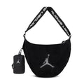 Black mesh ball carrier sling bag with Jumpman logo and adjustable shoulder strap