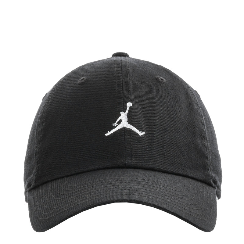 Black unstructured cap with white Jumpman logo and curved brim