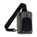 Jordan crossbody bag in medium olive with black front panel and logo, adjustable strap