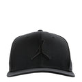 Black snapback cap with Jumpman logo on front panel.