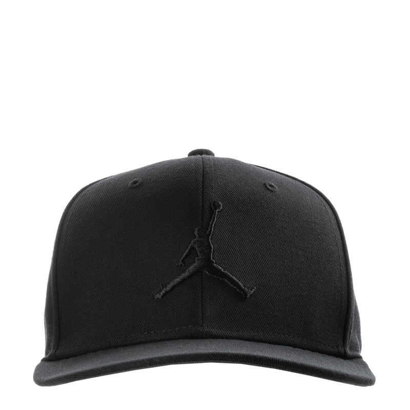 Black snapback cap with Jumpman logo on front panel.