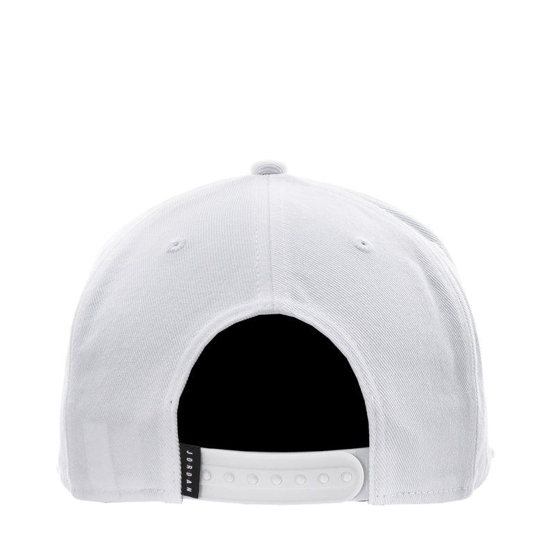 White snapback cap back view with dark inner brim and adjustable snap strap
