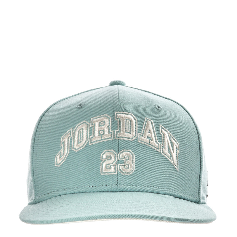 Light teal structured snapback cap with Jumpman '23' lettering and flat bill
