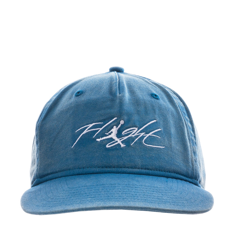 Faded blue strapback cap with white “Flight” signature logo on front