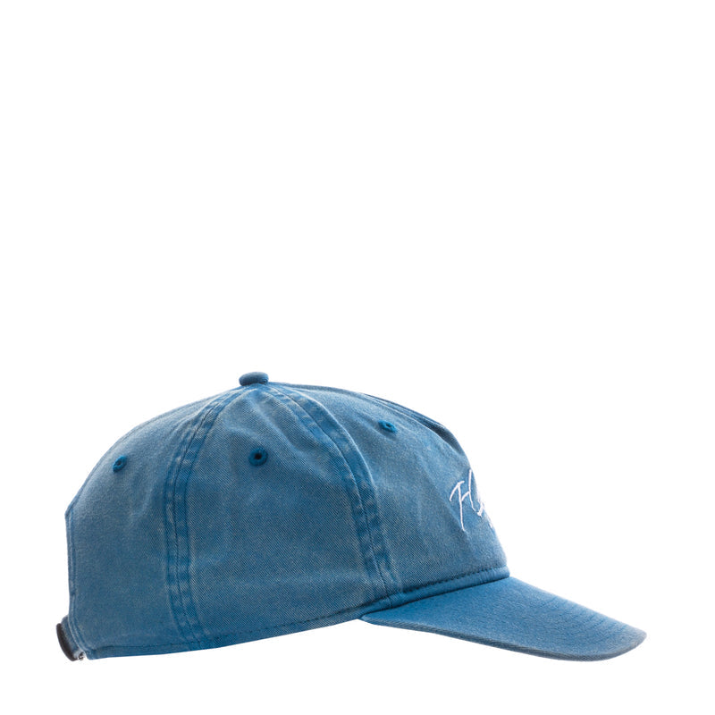 Faded blue strapback cap side profile with small “Flight” logo