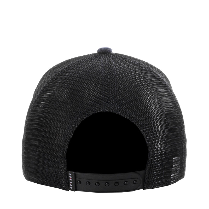 Black trucker cap rear view with mesh back and snapback strap