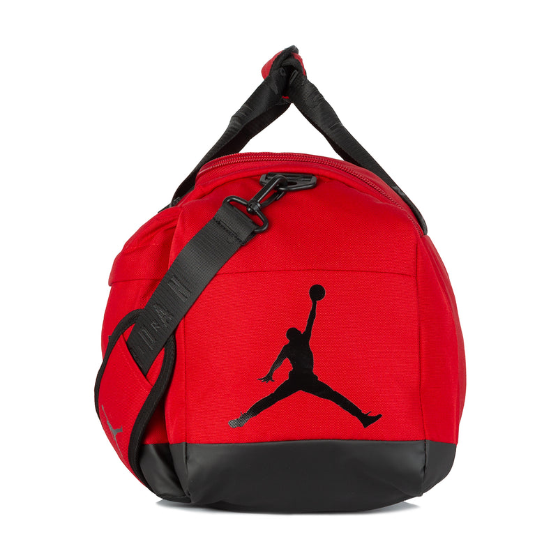 Small red duffel with black strap and Jumpman graphic on side panel