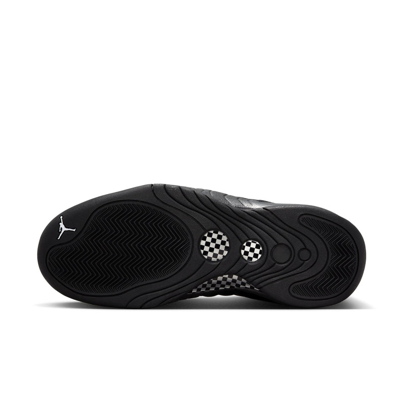 Black rubber outsole with checkered logo detail and wavy traction pattern