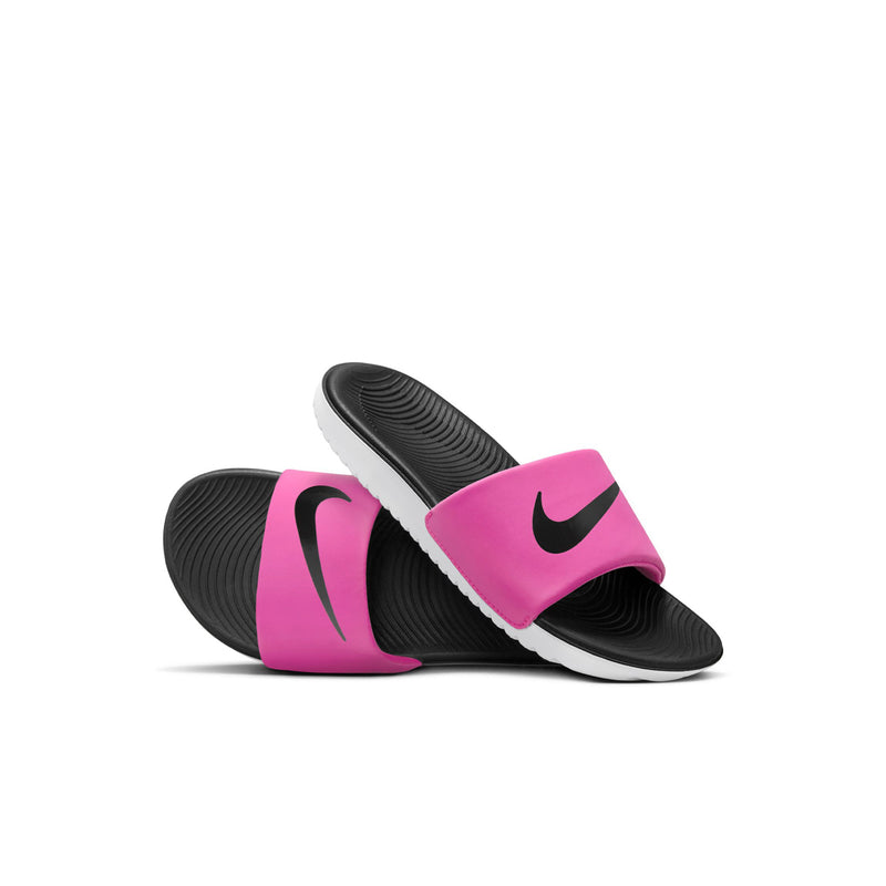Kids slide sandal pair, fuchsia strap with black Nike Swoosh, black footbed, white sole.