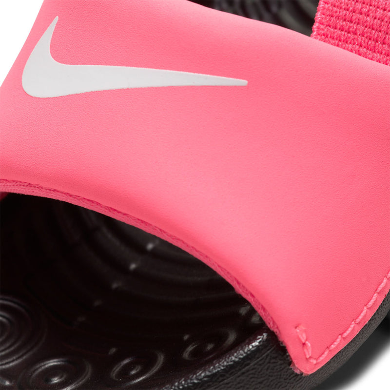 Toddler pink slide sandal close-up with white swoosh and black outsole edge