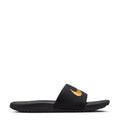 Youth black slide sandals with Nike gold swoosh on wide strap